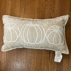 Beige and white accent pumpkin pillow